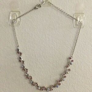 2/$15 Item 1 Necklace 17 inch silver tone chain with faux diamond setting